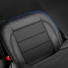 Close-up of black PU leather seat cover with perforated centre panel